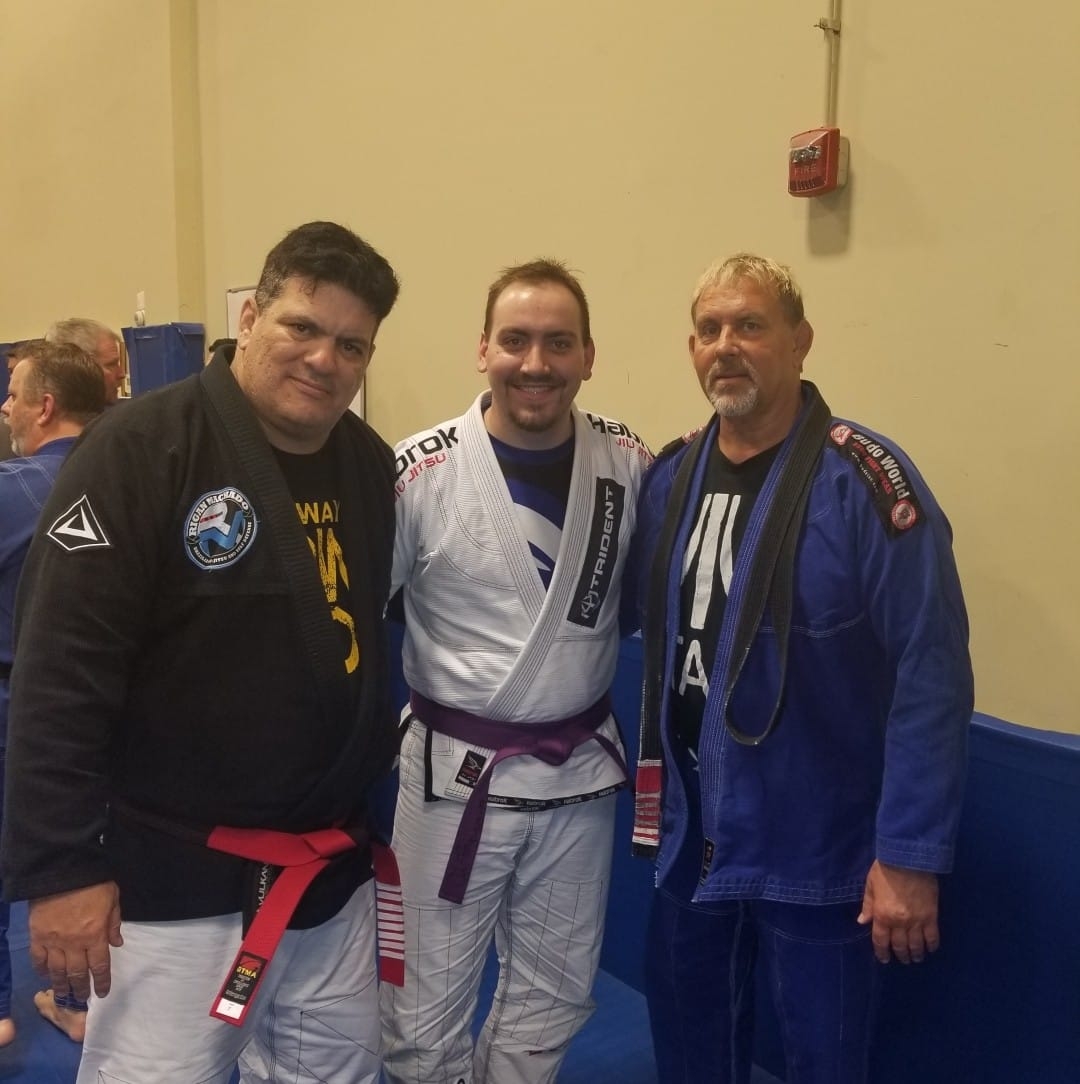 Coach Deric with Rigan Machado and Erik Paulson 2019